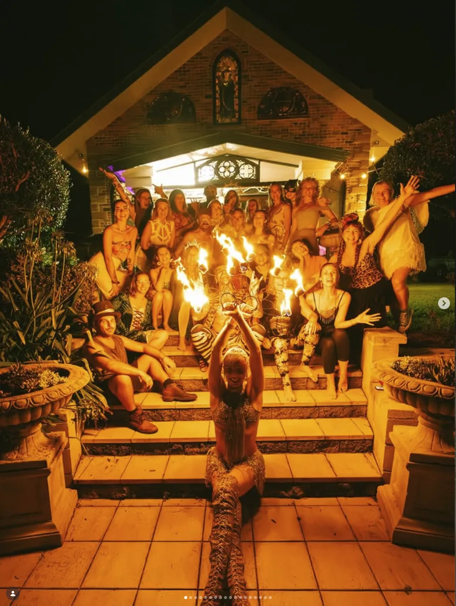 Fire ceremony group photo at a retreat